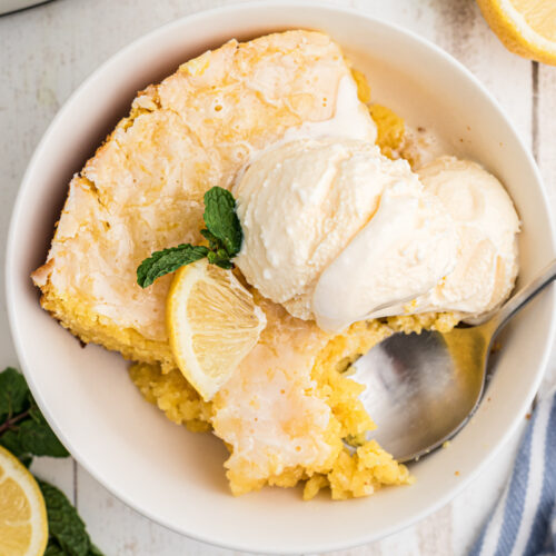lemon cake in a bowl with ice cream.