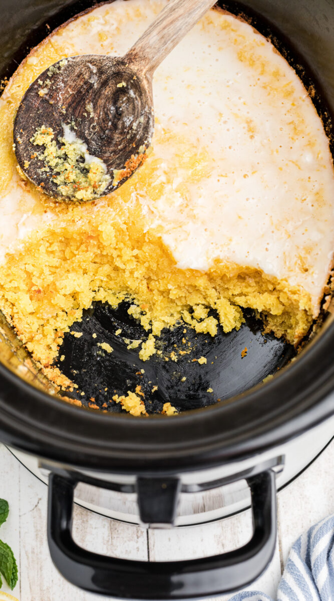 long image of lemon spoon cake in a slow cooker.