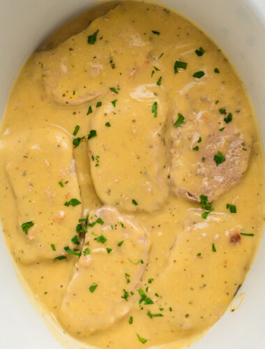 close up of ranch pork chops in the slow cooker.