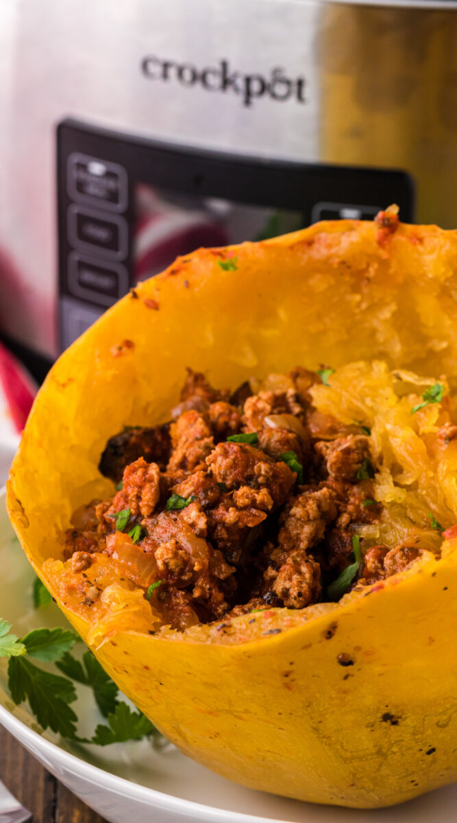 spaghetti squash half with meat sauce in it.