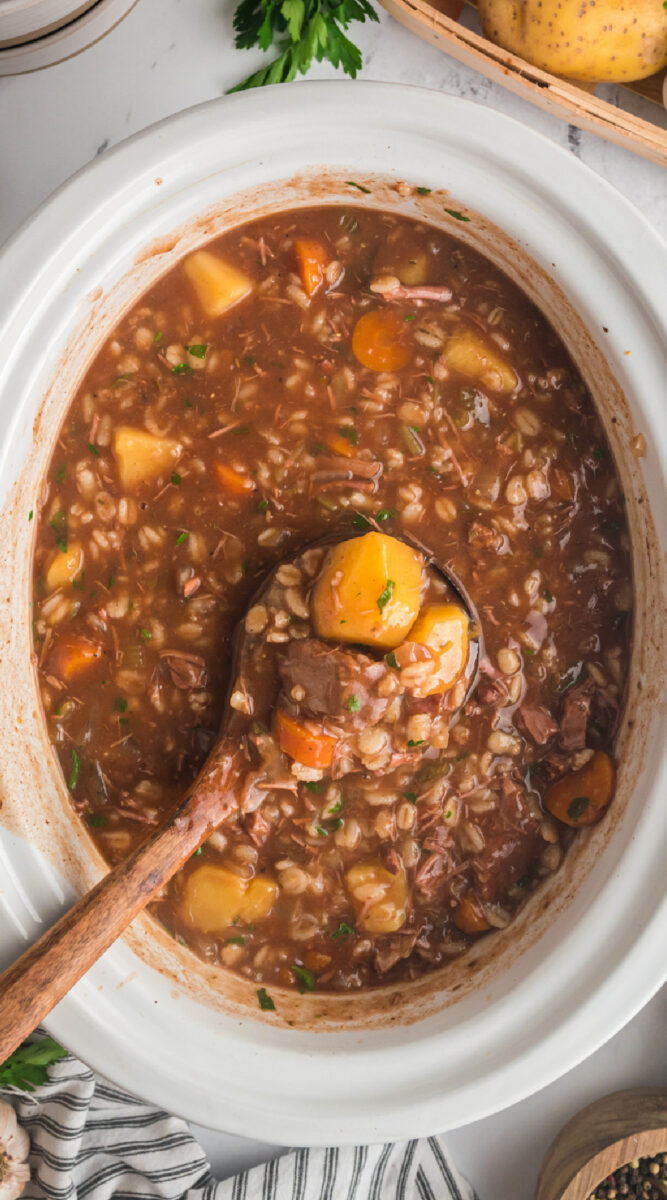 long image of beef barley soup for pinterest.