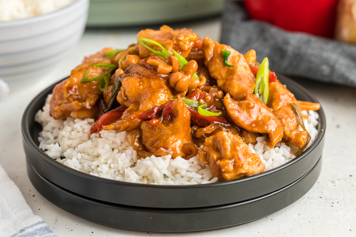 plate of cashew chicken over rice.
