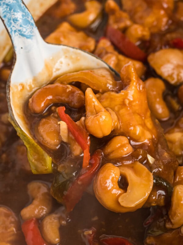 cashew chicken on a spoon.