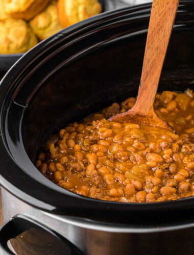 cooked cowboy baked beans in a slow cooker.