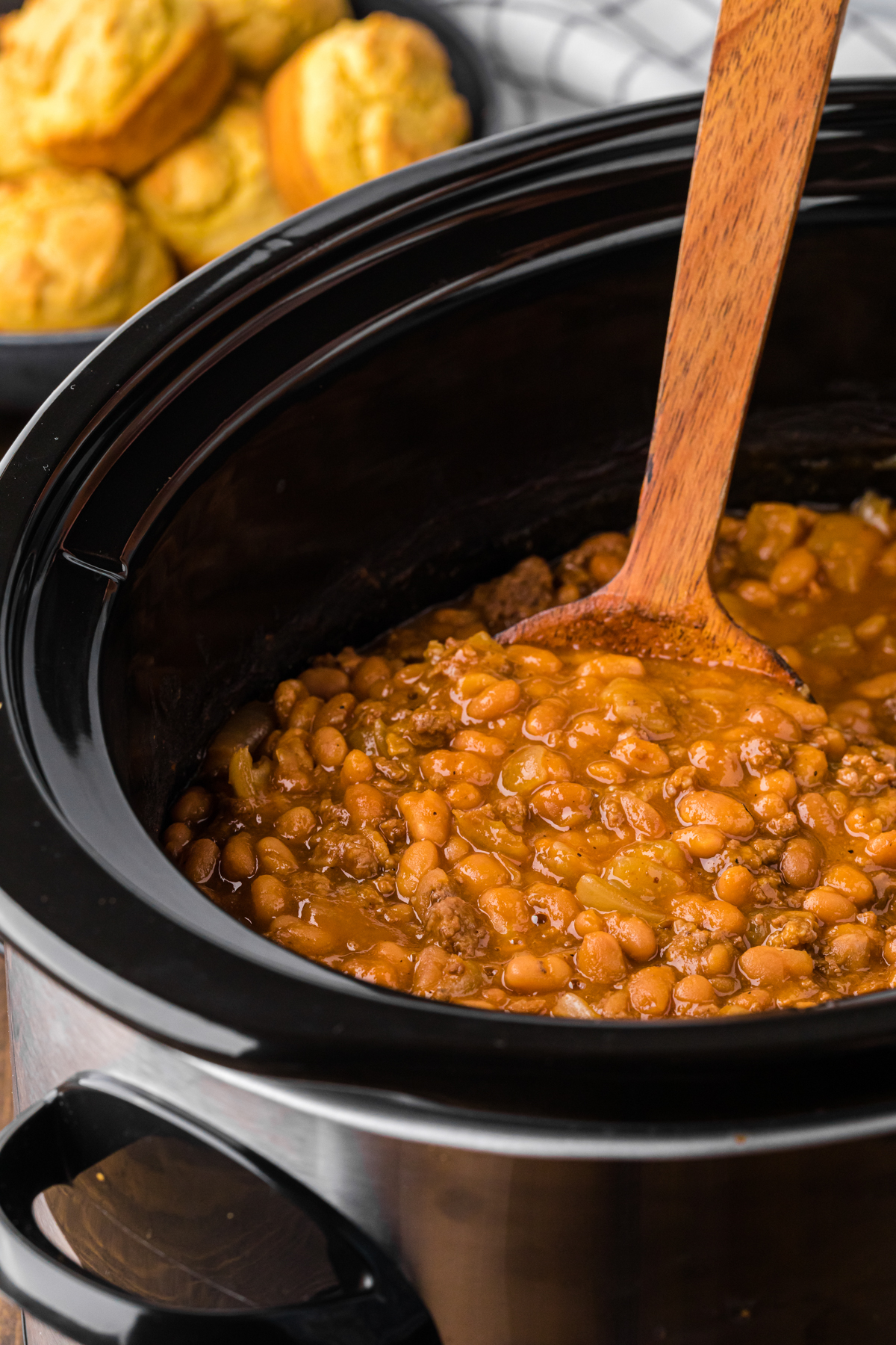 cooked cowboy baked beans in a slow cooker.
