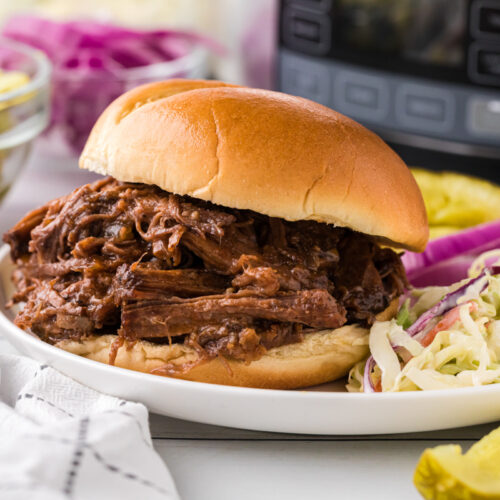 Barbecue beef on a hamburger bun.