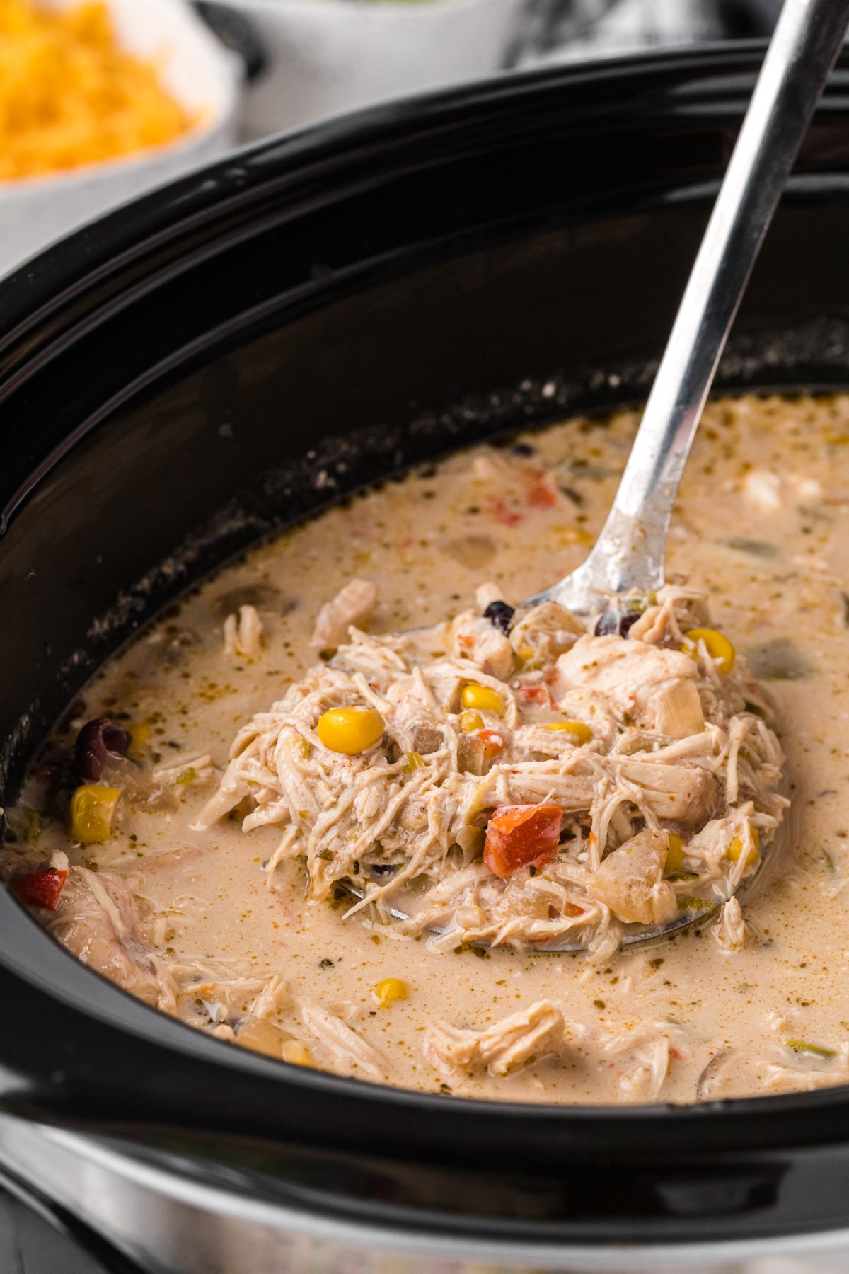 Cooked Chicken fajita soup in a crockpot.