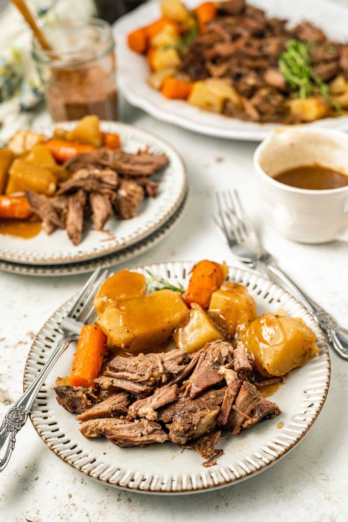 Cooked pot roast with potatoes and carrots.