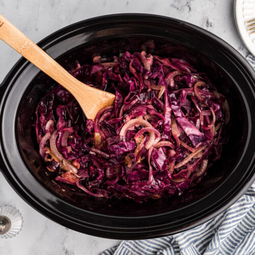 overhead shot of red cabbage in a slow cooker.