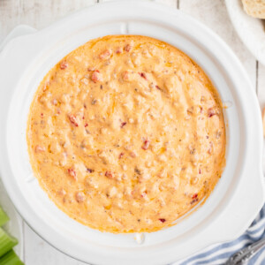 overhead shot of warm pimento dip in a slow cooker.