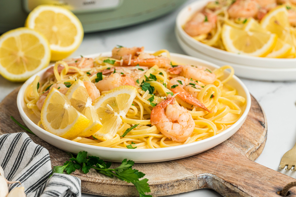 shrimp and pasta on a plate.