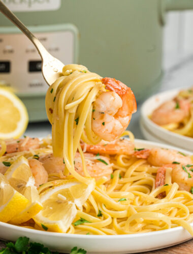 shrimp scampi on a fork.