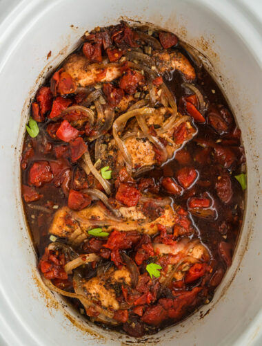 Chicken in slow cooker with balsamic vinegar and tomatoes.