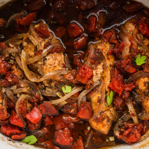 overhead shot of balsamic chicken in slow cooker.