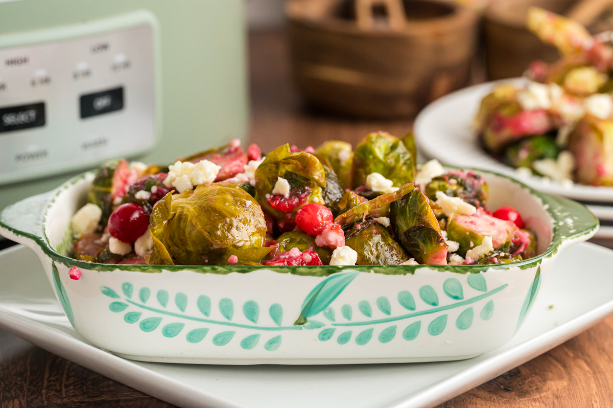 colorful bowl full of brussels sprouts.