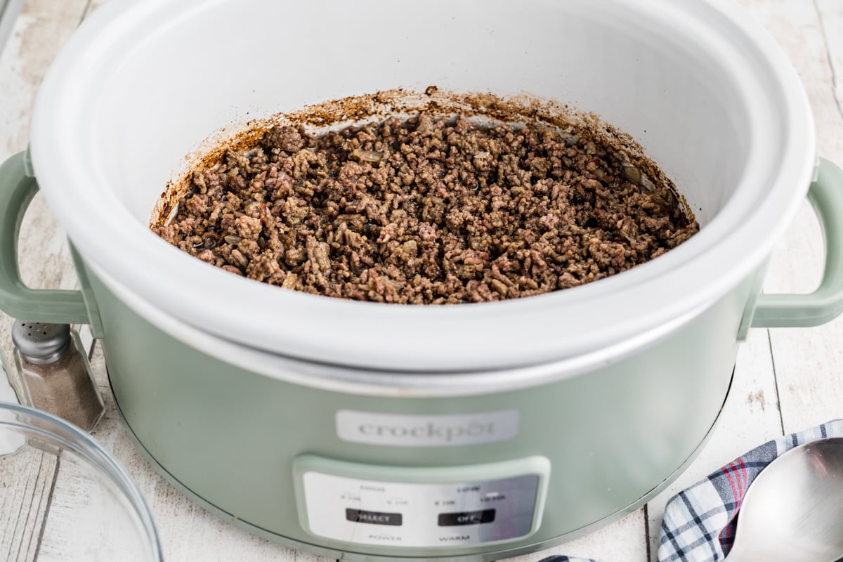 cooked ground beef in a slow cooker.
