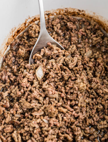 Cooked ground beef in a crockpot.