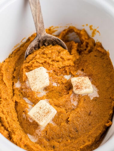close up of mashed sweet potatoes in a crockpot.