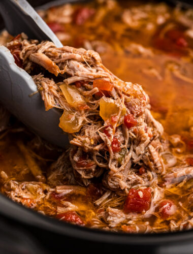 Close up of pork burrito filling in a slow cooker.