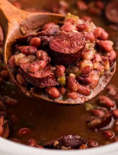 Crockpot red beans on a spoon.