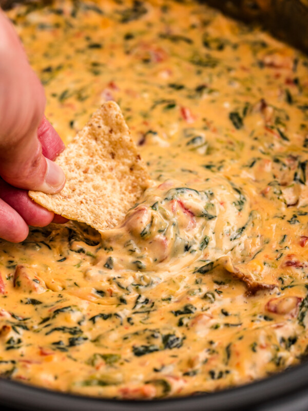 Velveeta spinach dip with a chip.