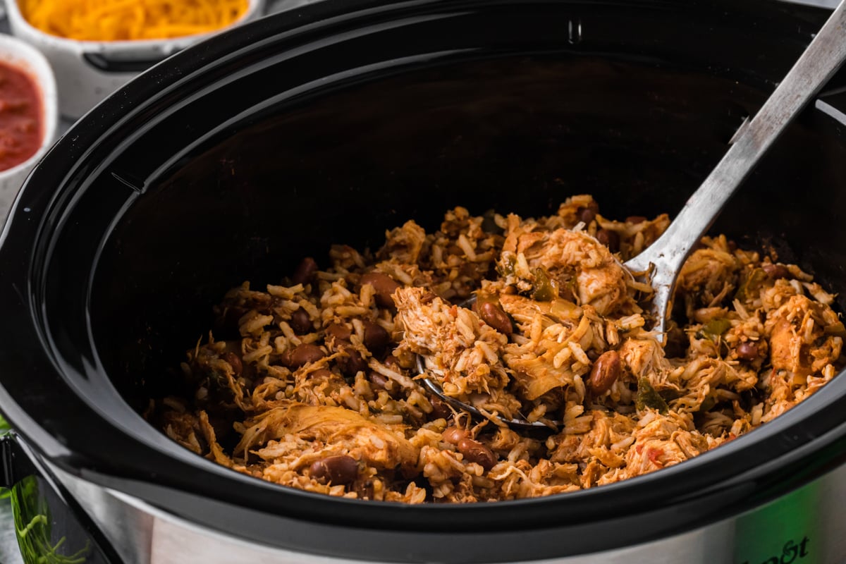 Pot of chicken, rice and beans.