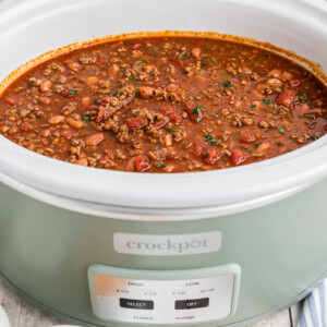 Chili in a green crockpot.
