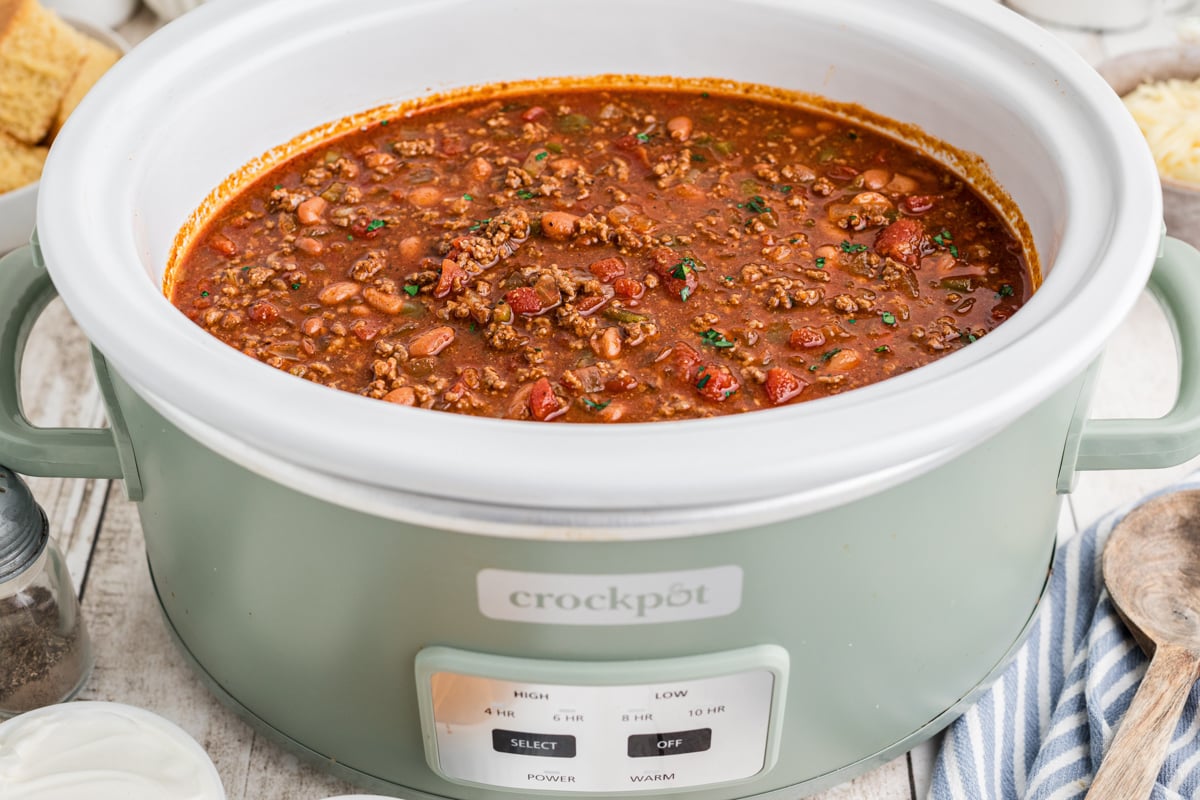 Chili in a green crockpot.