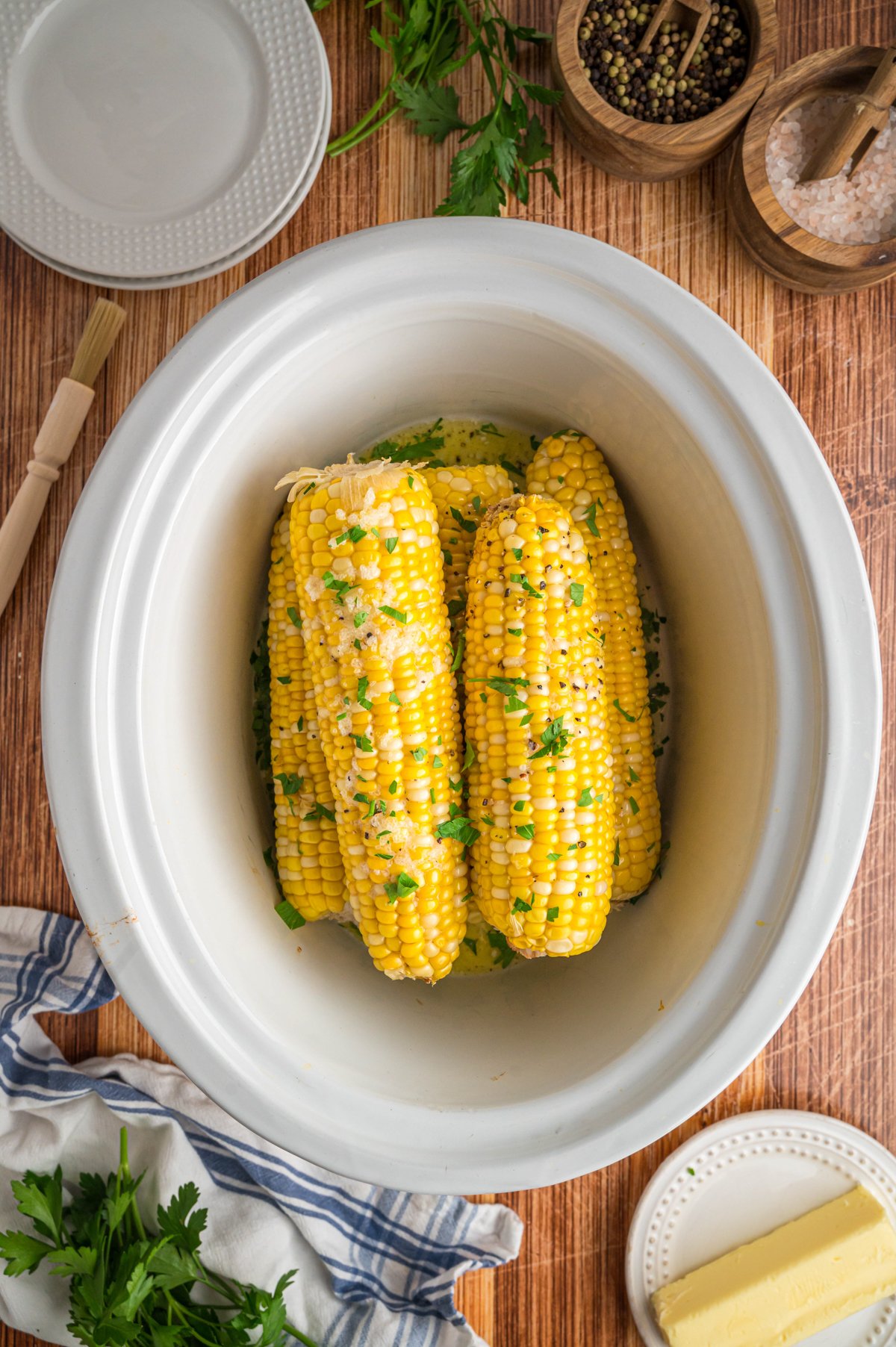 cooked corn on the cob in a slow cooker.