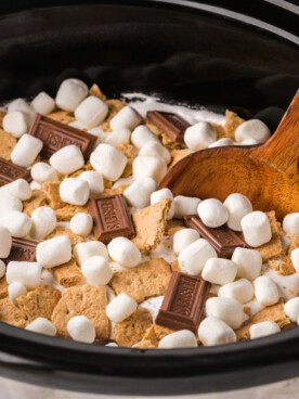 side view of chocolate cake with marshmallows and hershey bars.