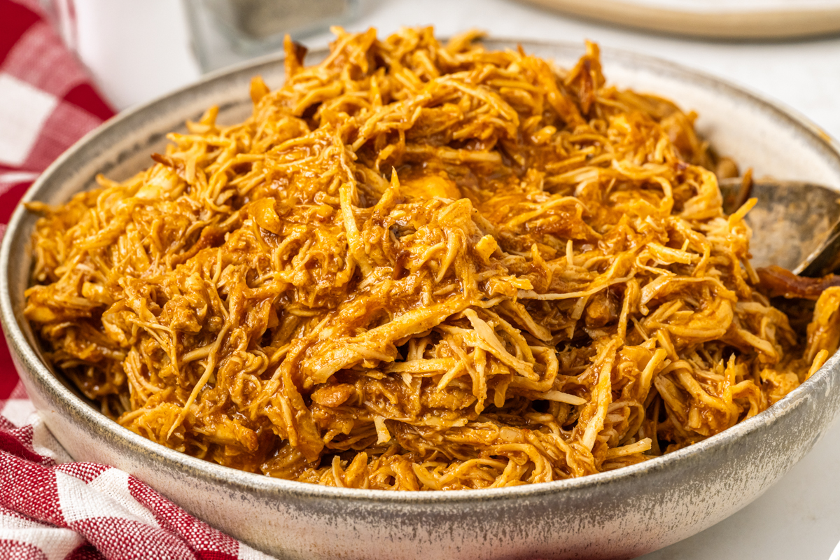 Bowl of shredded chicken.