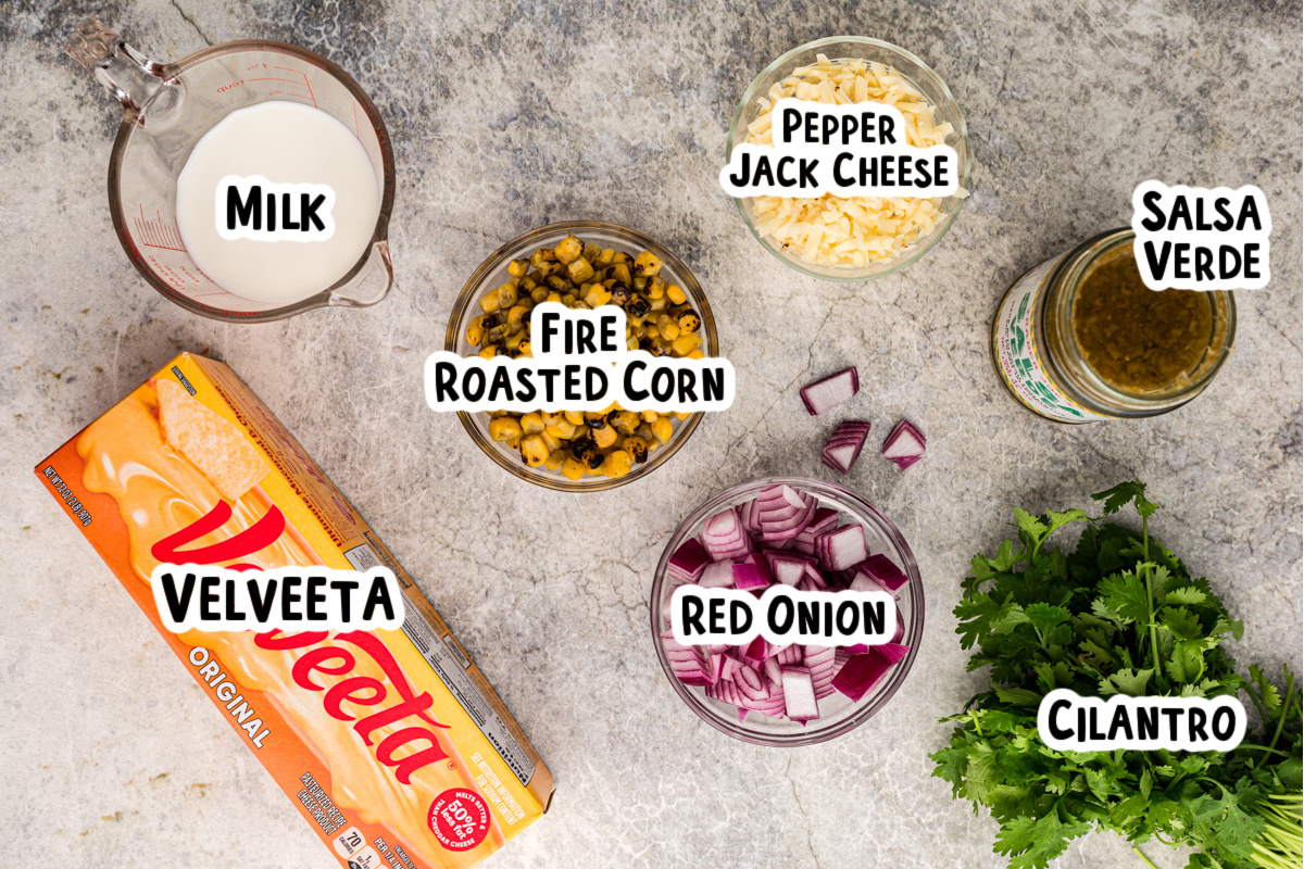 Ingredients for corn dip on a table.
