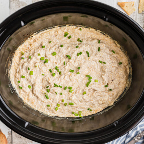 cooked french onion dip in a crockpot.