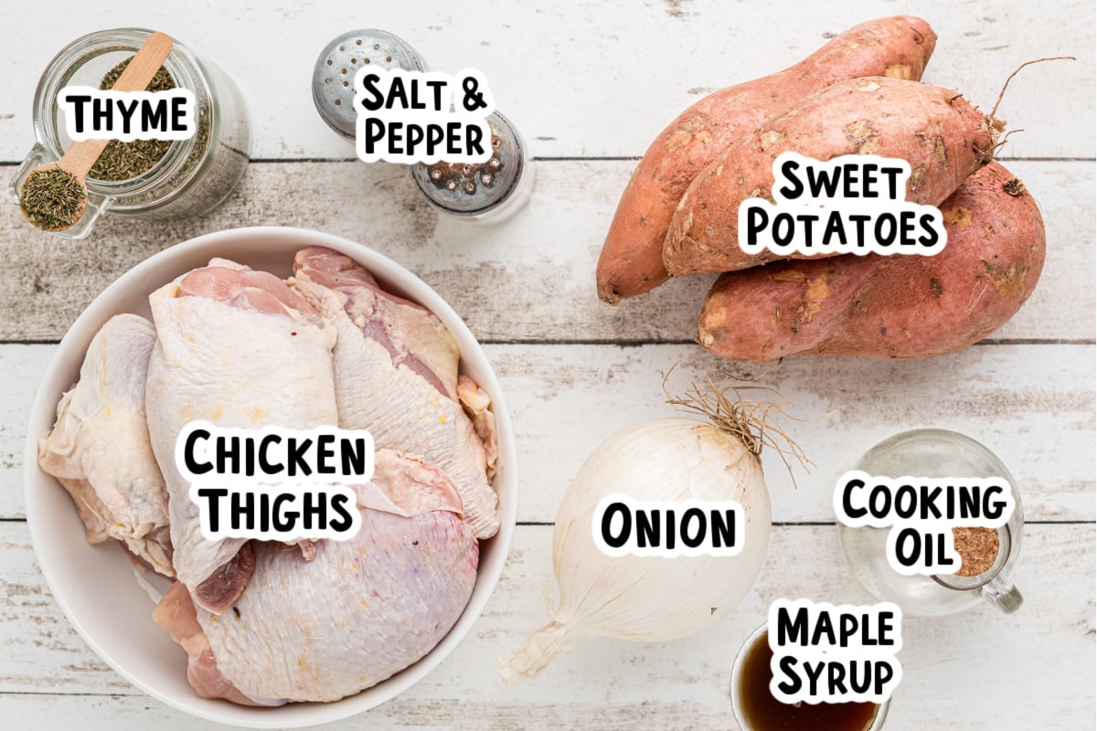 Ingredients for chicken thighs and sweet potatoes on a table.