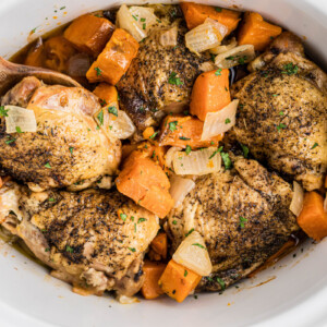 Chicken and thighs with sweet potatoes and onions.