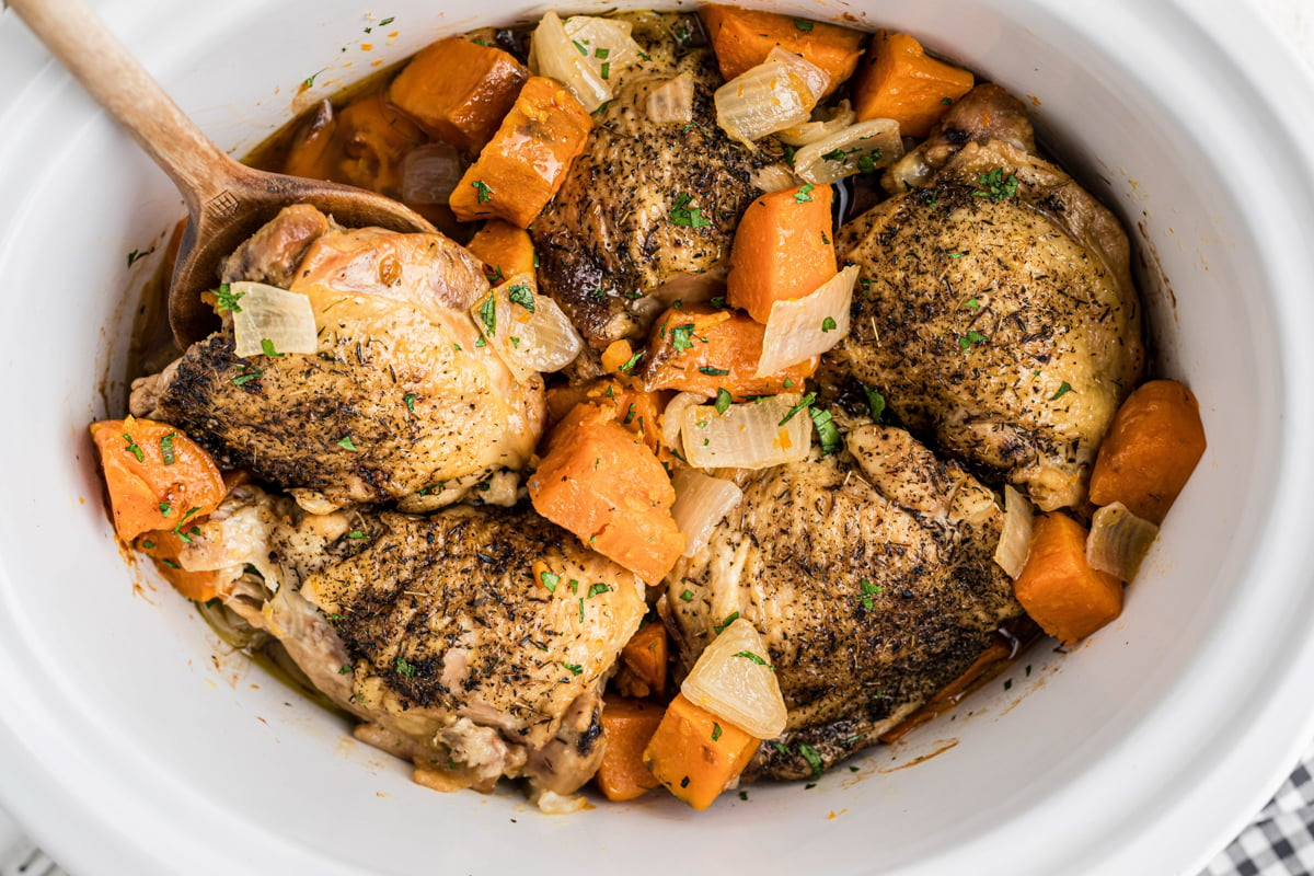 Chicken and thighs with sweet potatoes and onions.