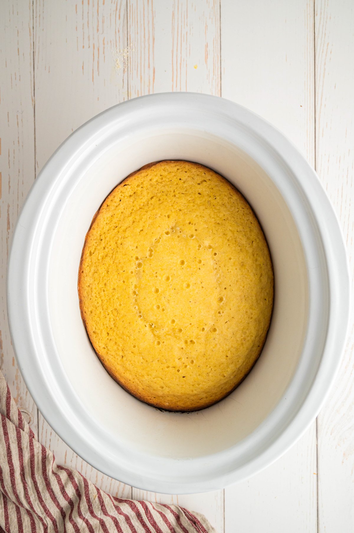 Done cooking cornbread in a slow cooker.