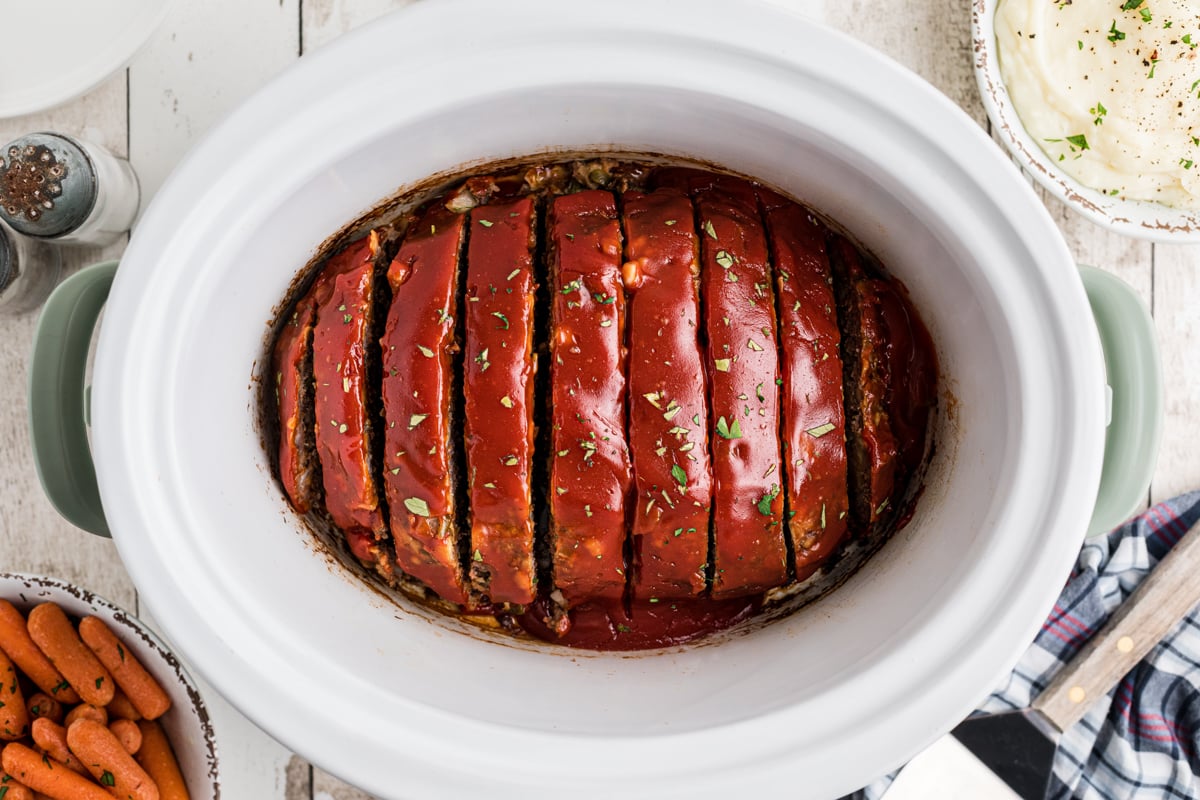 Overhead shot of cooked meatloaf in a crockpot.