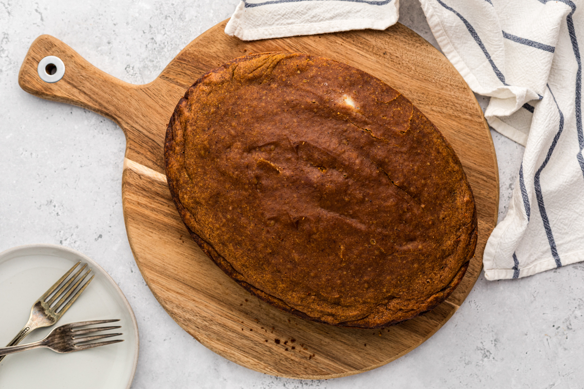 Pumpkin bread on a cutting board.