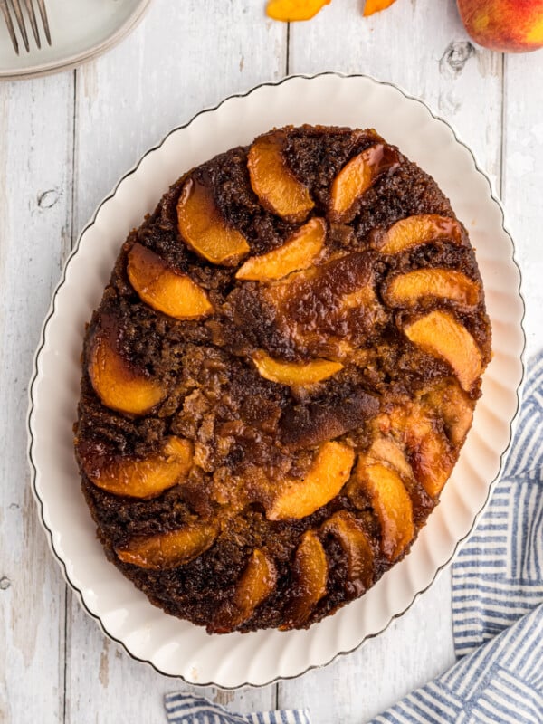Peach cake on a platter.