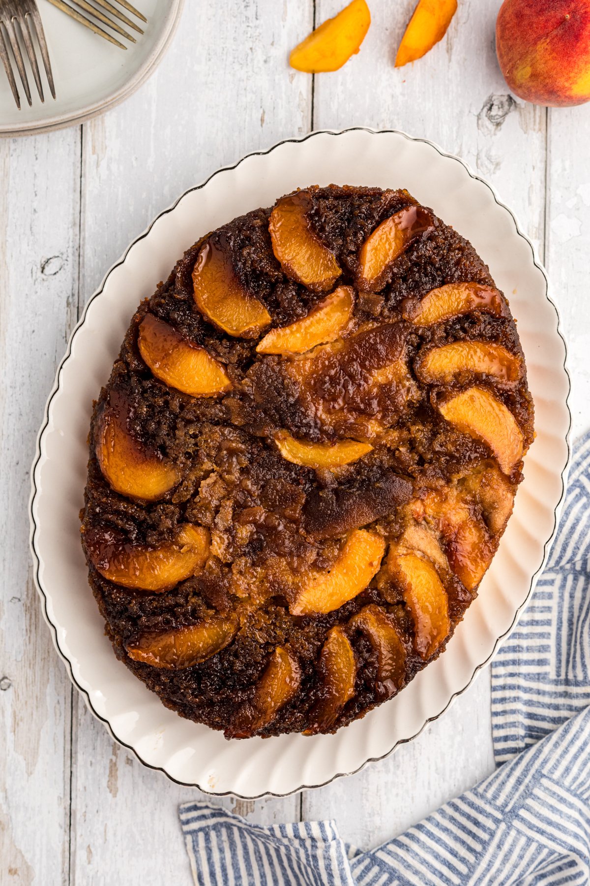Peach cake on a platter.