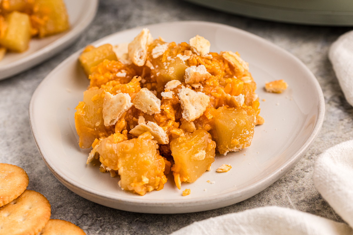 Pineapple casserole on a white plate.