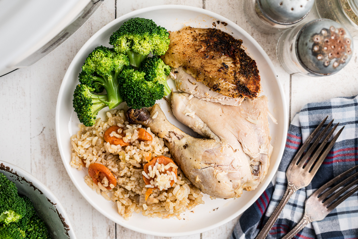 Overhead shot of chicken, rice and broccoli on a plate.