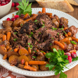 Platter of cranberry pot roast with vegetables.