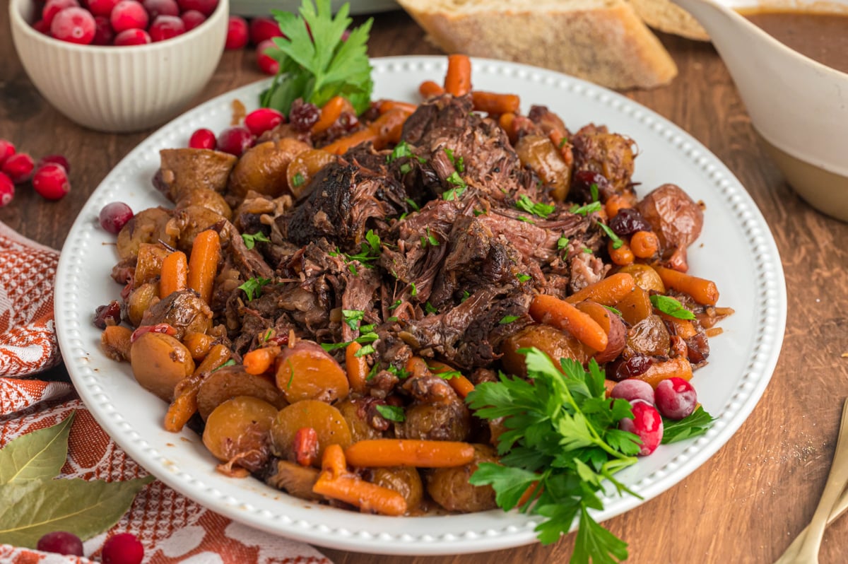 Platter of cranberry pot roast with vegetables.