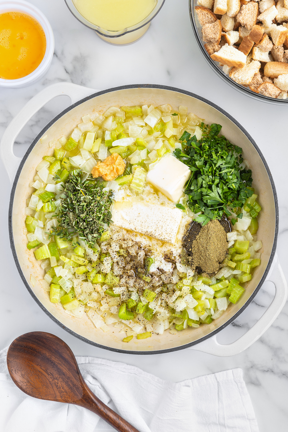 Onions, celery, butter and seasonings in a pan.