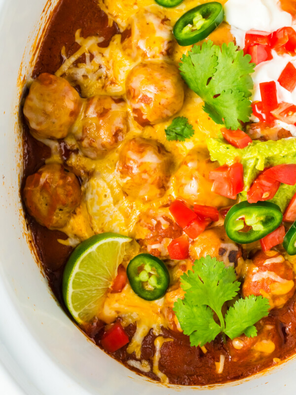overhead close-up of slow cooker enchilada meatballs.
