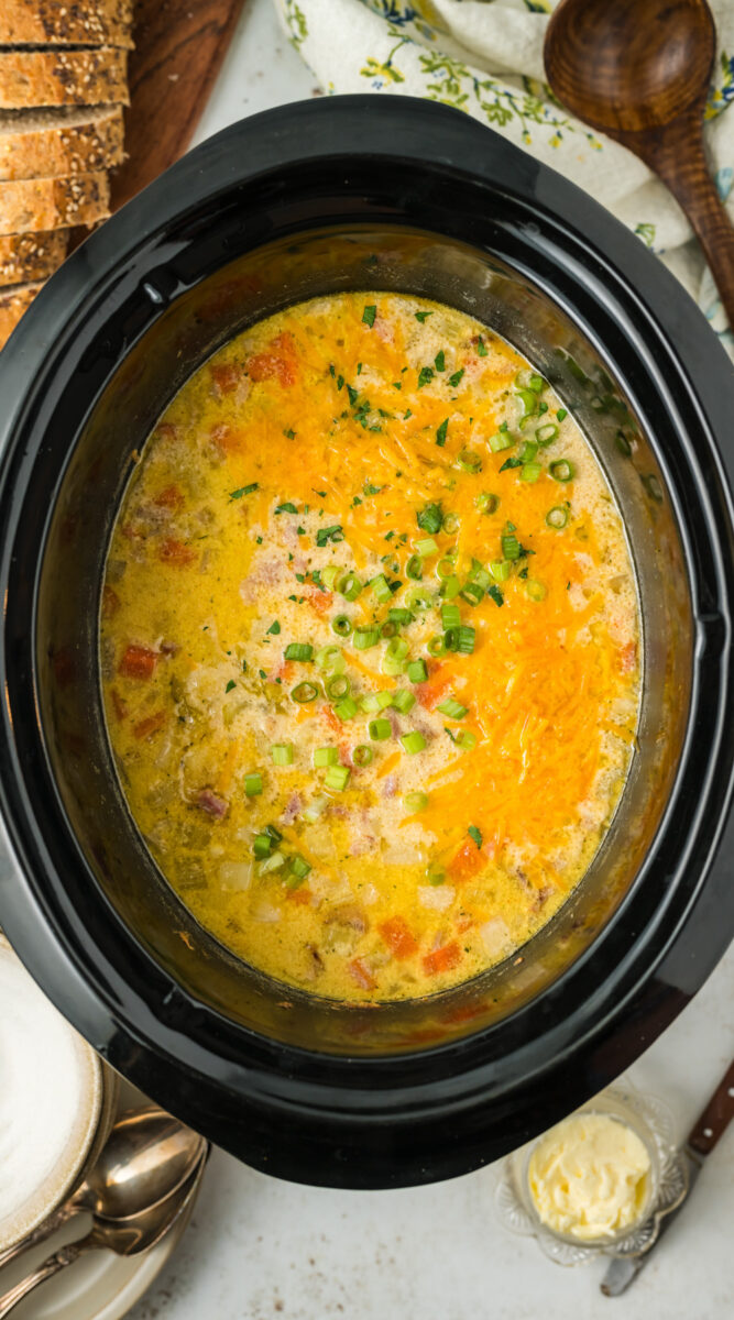 long image of slow cooker ham and potato soup.