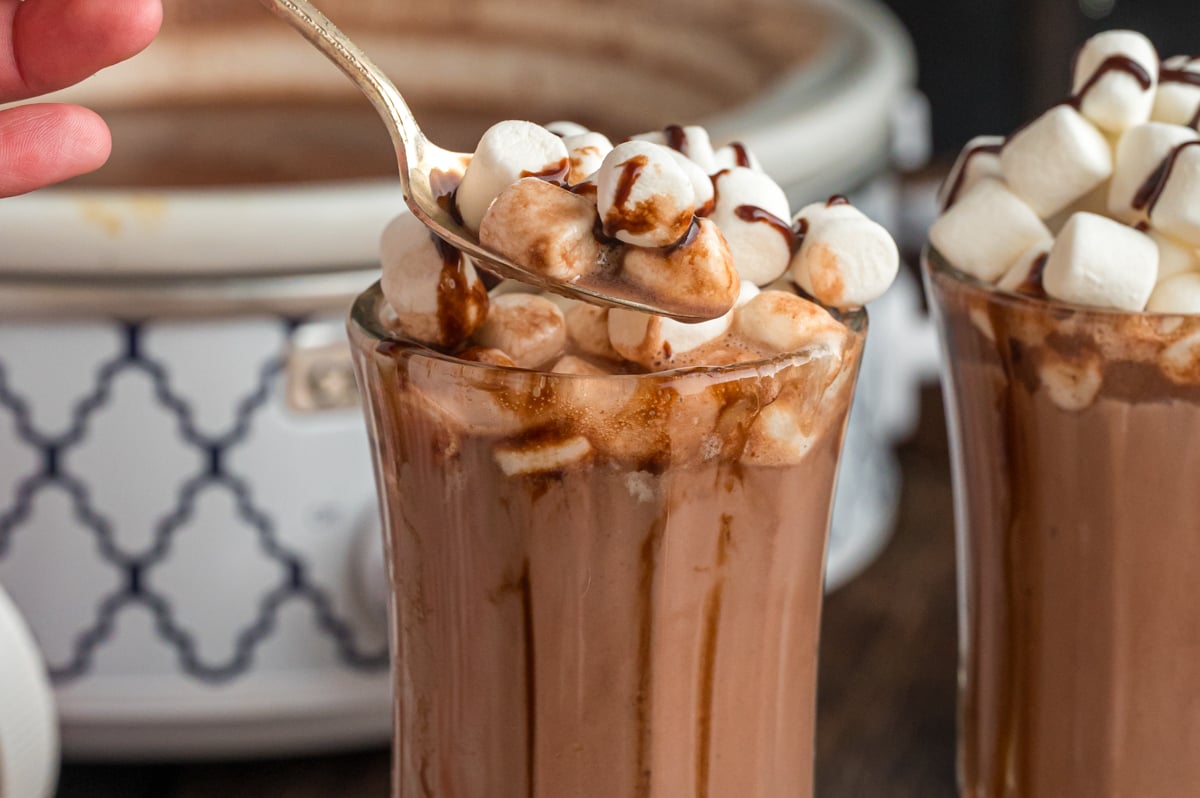 nutella hot chocolate in a mug and on a spoon.