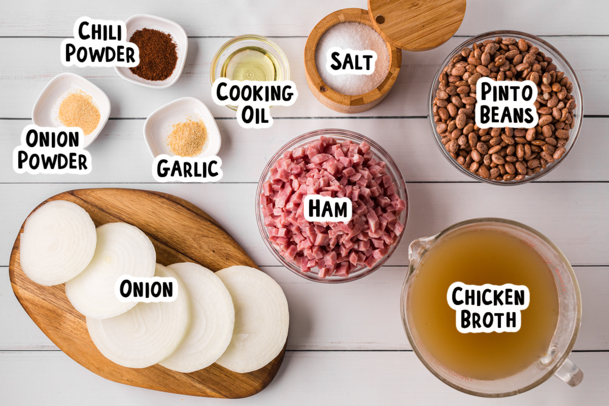 Ingredients for pinto beans and ham on a table.